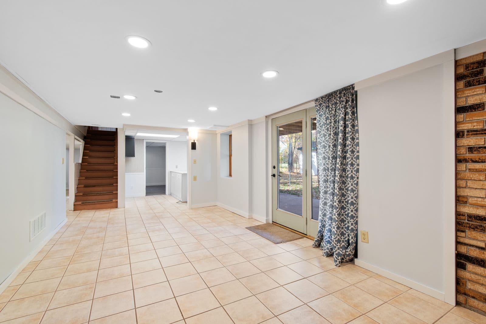 Bright finished basement with patio access